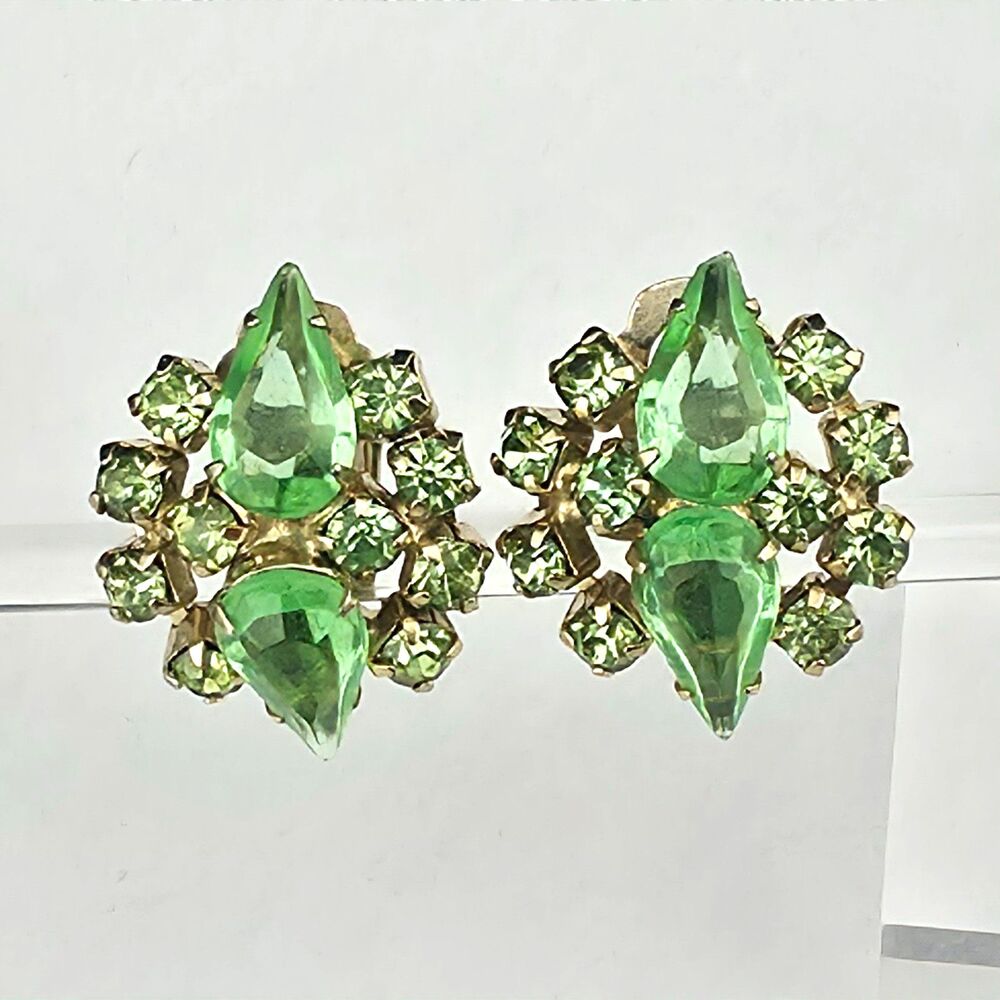 Vintage Light Green Rhinestone Gold Tone Clip On Starburst Earrings 1 1/8"